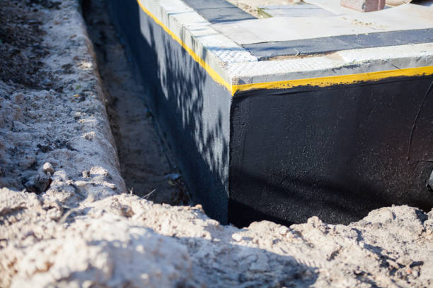 Professional Emergency Waterproofing technician working in Keuka Park, NY